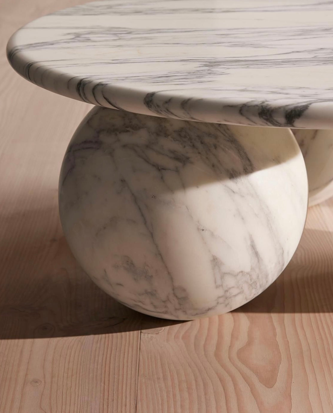 Oval cut marble coffee table